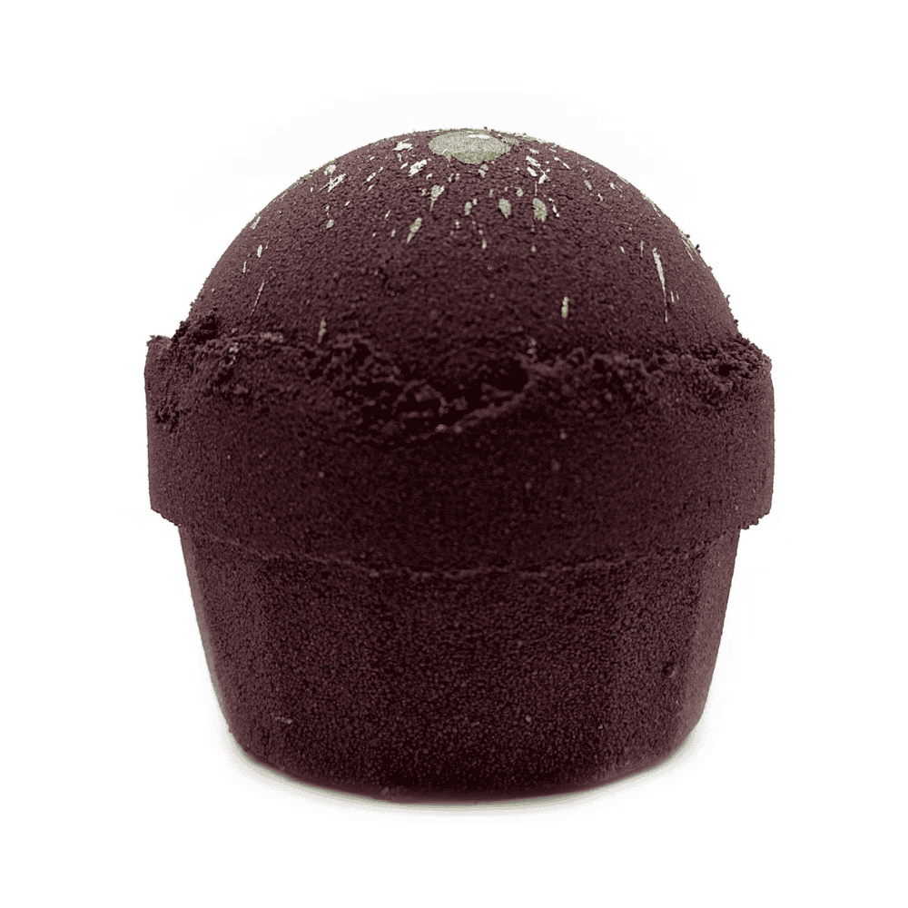 Brown bath bomb with textured surface on a white background