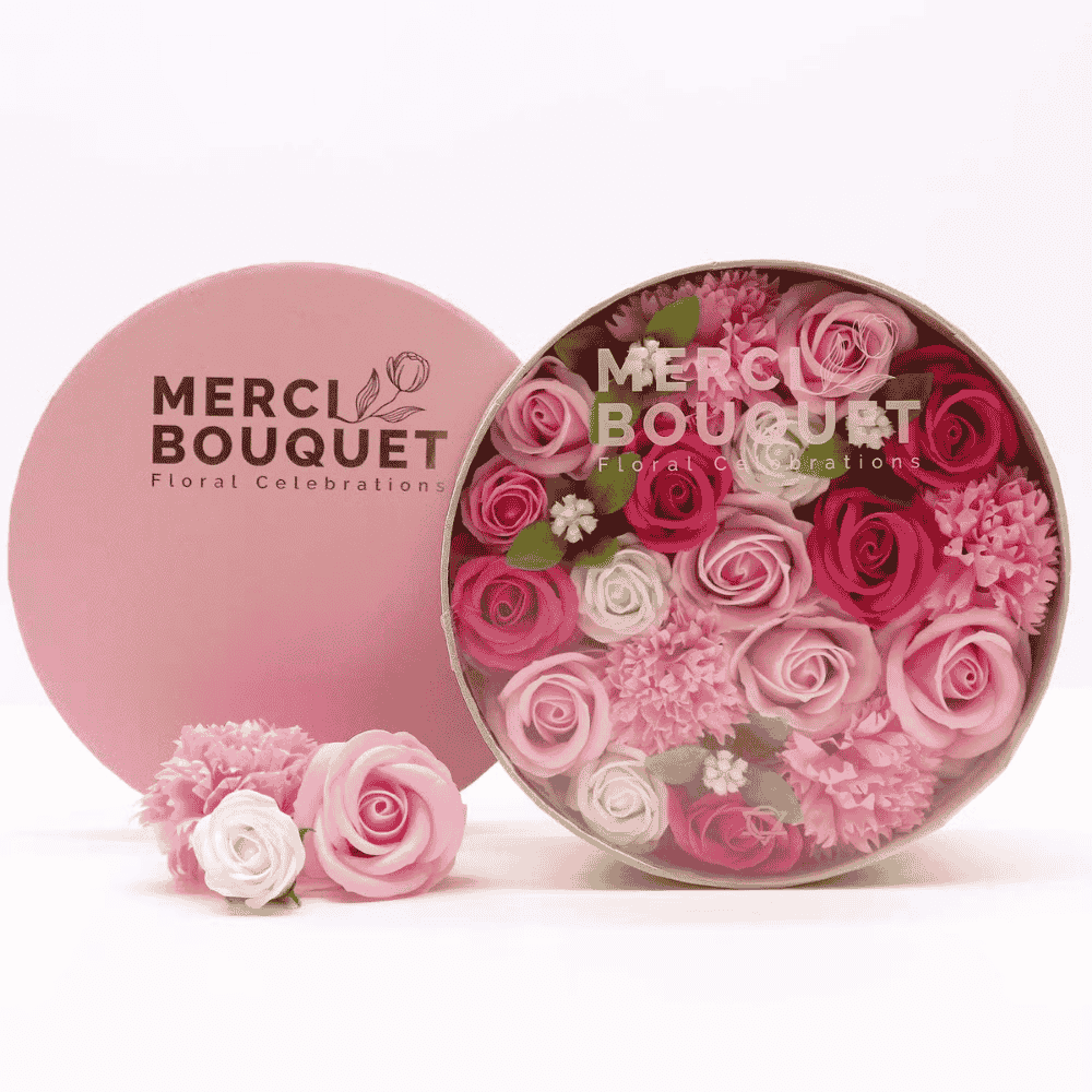 Merci Bouquet floral container with pink and white soap flowers on a white background