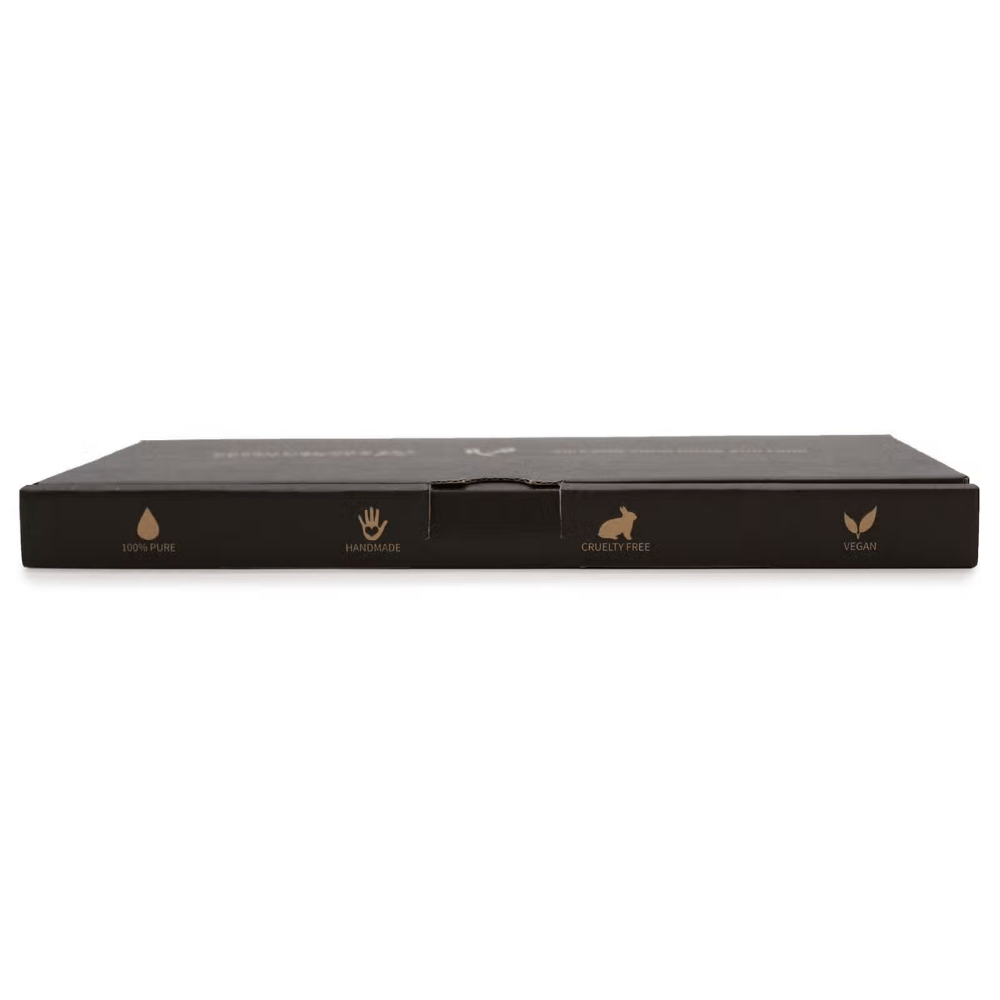 Black rectangular product packaging with gold symbols on a white background