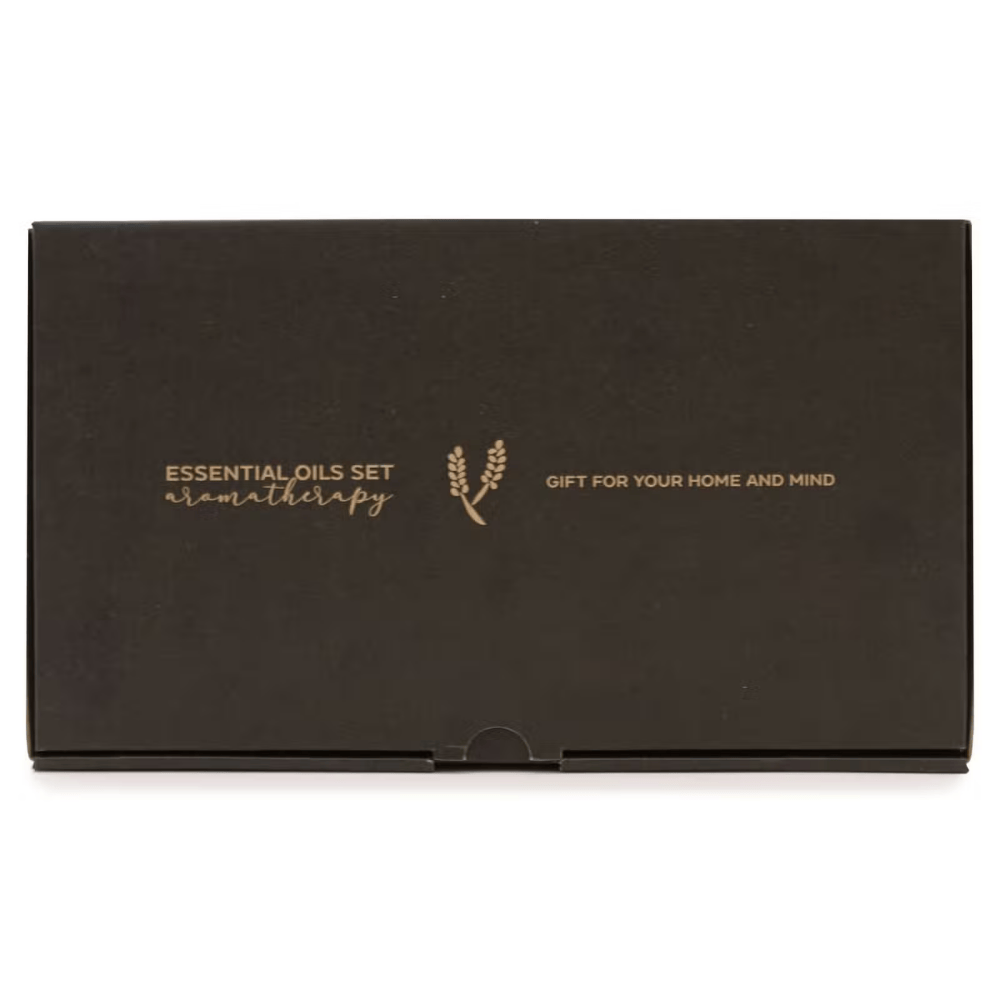 Black box with gold text and logo for essential oils set on a white background