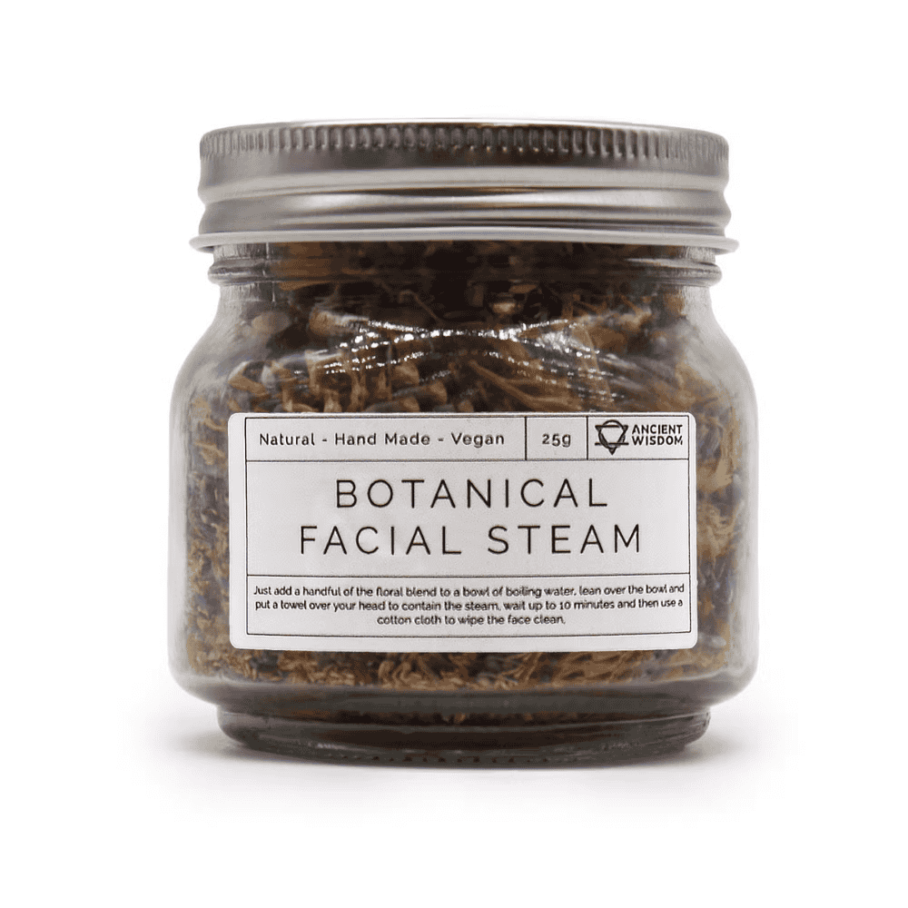 Jar of botanical facial steam with a label on a white background